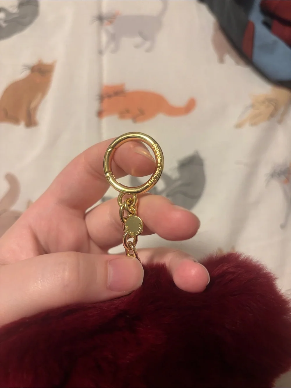 michael kors teddy bear pom pom keychain